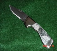 3 3/4 inch Choctaw serrated 	blade folder