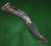 4 inch Skinner 	with gut 	hook